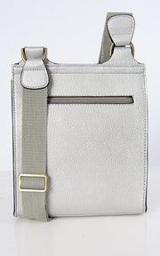An image showing a silver messenger bag.