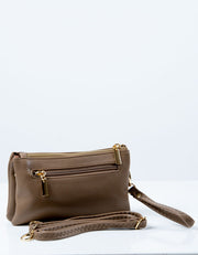 an image of a brown clutch bag