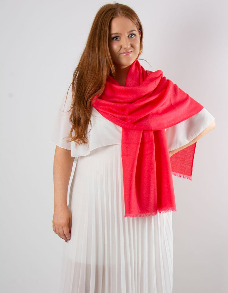an image showing a coral cashmere pashmina for weddings