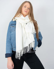 an image showing a cream blanket scarf