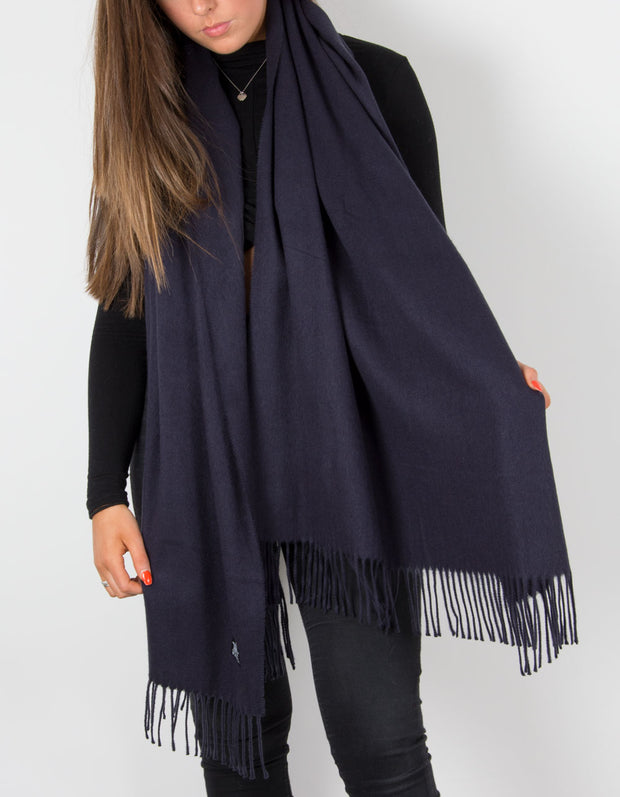 an image showing a navy blanket scarf