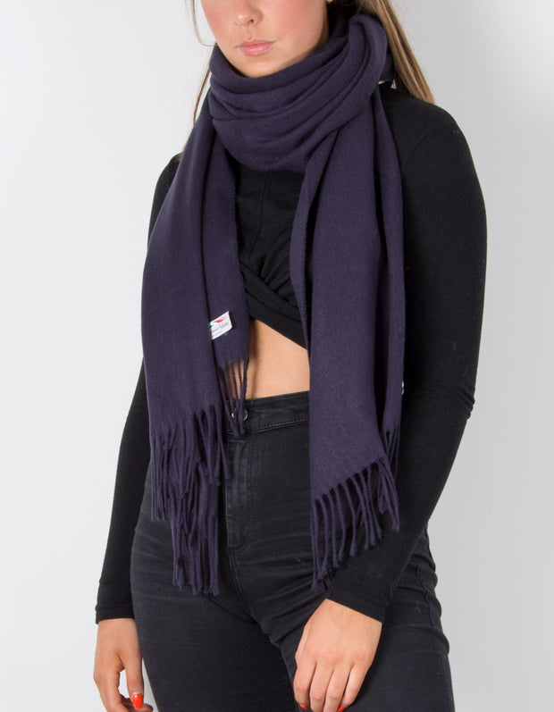 an image showing a navy blanket scarf