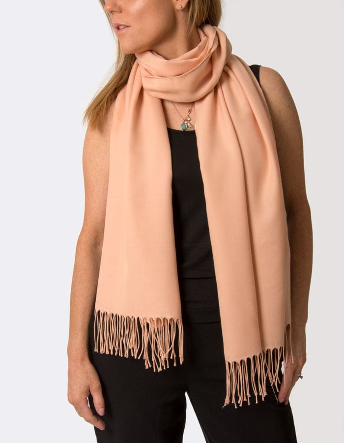 an image showing a peach pink coloured pashmina