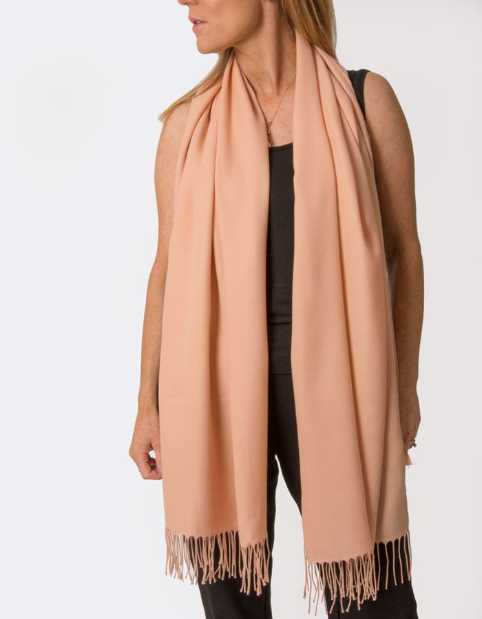 an image showing a peach pink coloured pashmina