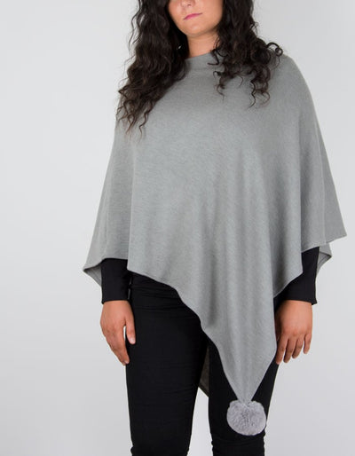 An image showing a dark grey poncho