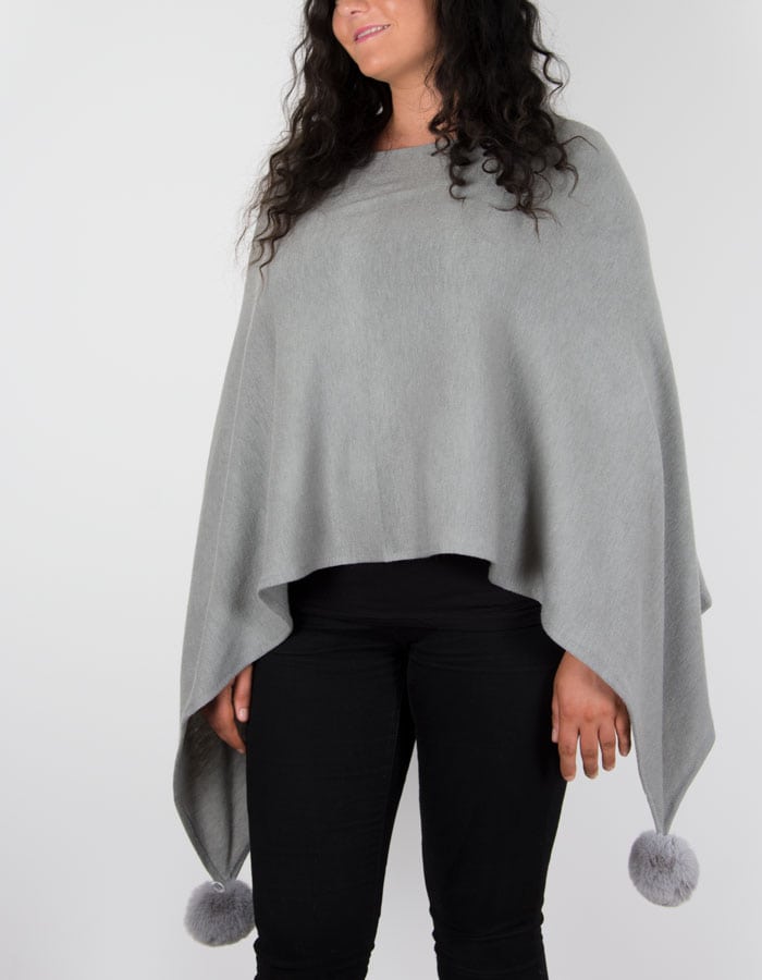 An image showing a dark grey poncho