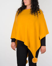 An image showing a mustard poncho