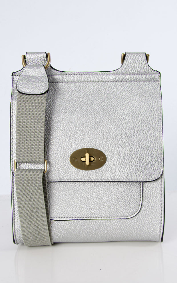 An image showing a silver messenger bag.