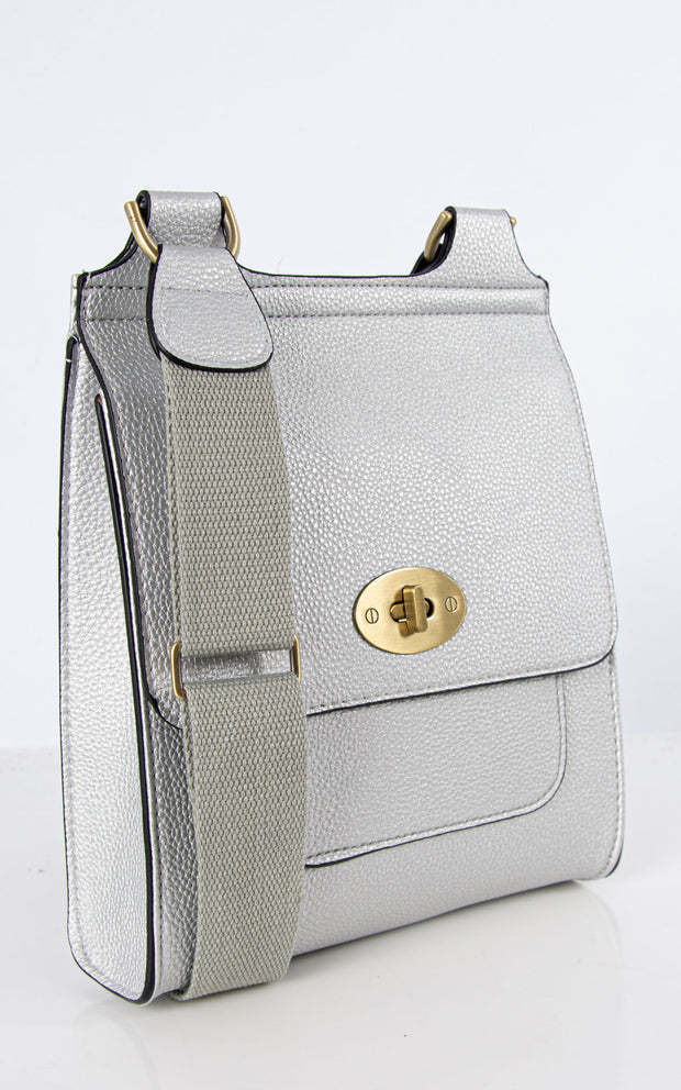 An image showing a silver messenger bag.