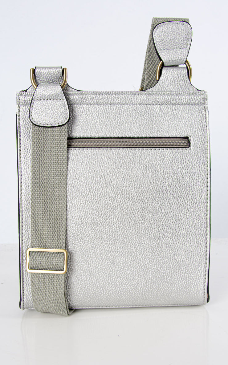 An image showing a silver messenger bag.
