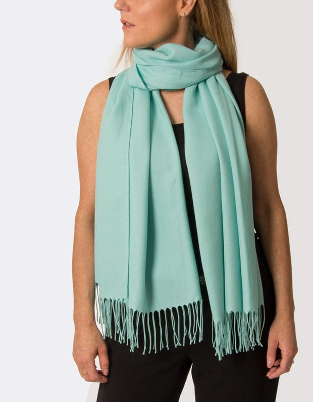 an image showing a turquoise pashmina