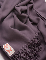 an image showing a close up of a pashmina in Aubergine purple