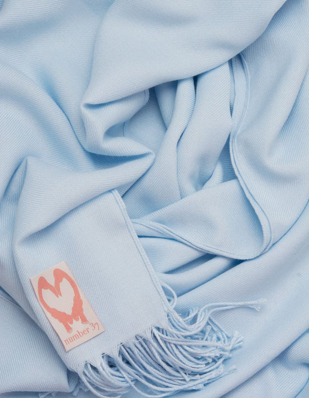 an image showing a close up of a baby blue pashmina 