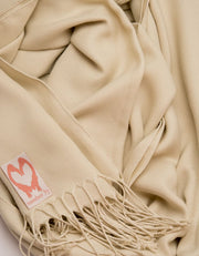 an image showing a close up of a pashmina in Beige