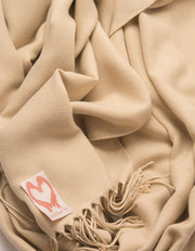 an image showing a close up of a pashmina in Biscuit