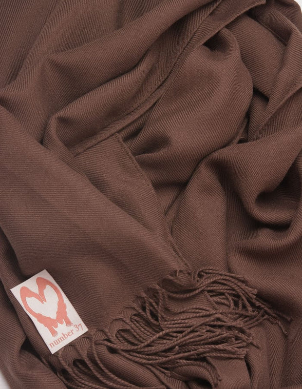 an image showing a close up of a pashmina in Brown
