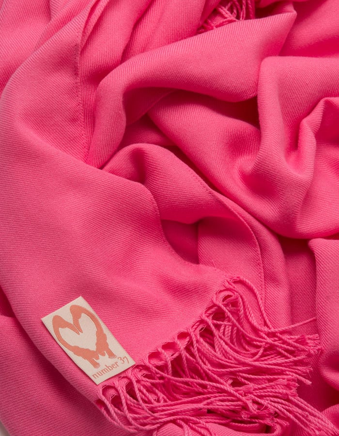 an image showing a close up of a pashmina in Hot Pink 1