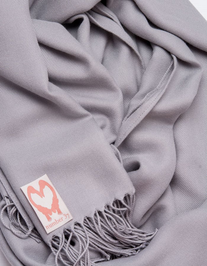 an image showing a close up of a pashmina in Mid Grey
