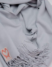 an image showing a close up of a pashmina in Pale Grey