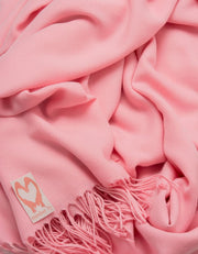 an image showing a close up of a pashmina in Pink Lady pink