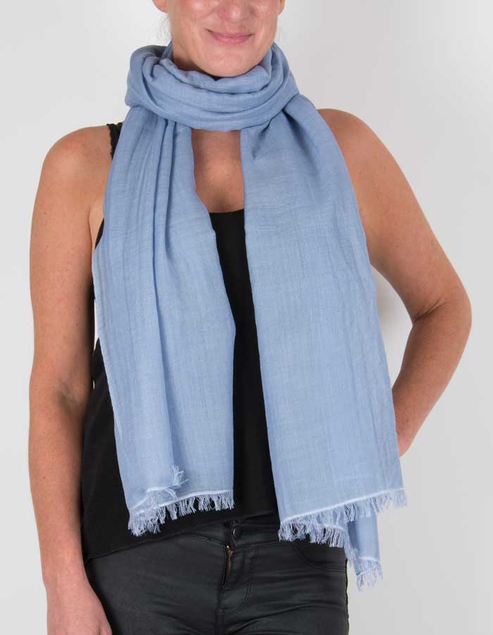 an image showing a silk wool mix pashmina in blue