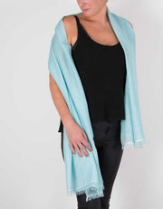 an image showing a silk wool mix pashmina in green