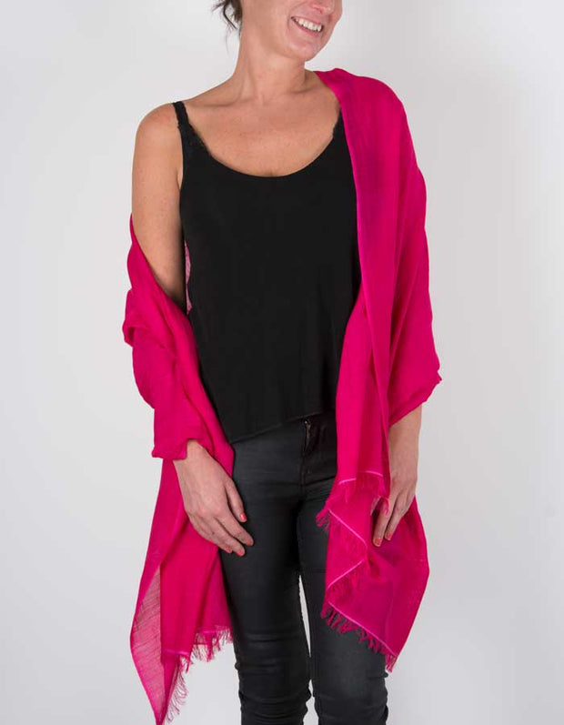 an image showing a silk wool mix pashmina in hot pink