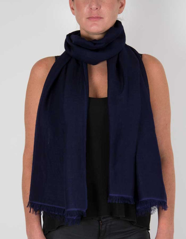 an image showing a wool silk mix pashmina in navy blue