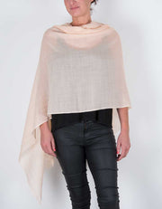 an image showing a wool silk mix pashmina in peach