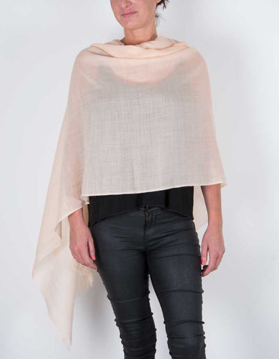 an image showing a wool silk mix pashmina in peach