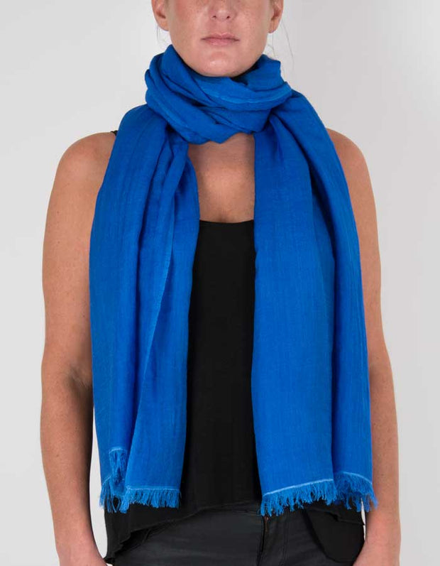 an image showing a wool silk mix pashmina in royal blue