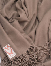 an image showing a close up of a pashmina in Taupe