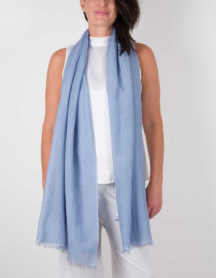 an image showing a silk wool mix wedding shawl in blue