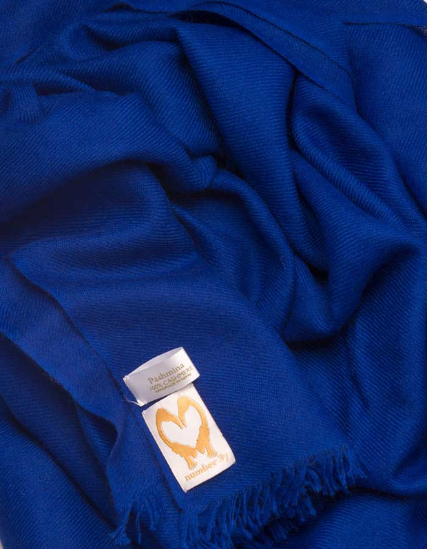 an image showing a cobalt blue cashmere pashmina scarf