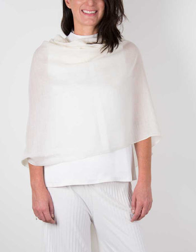 an image showing a silk wool mix wedding shawl in ivory