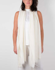 an image showing a silk wool mix wedding shawl in ivory