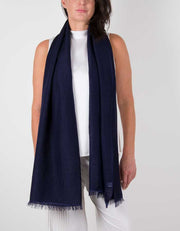 an image showing a silk wool mix wedding shawl in navy blue