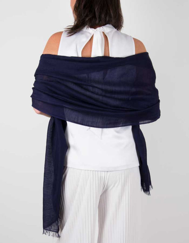 an image showing a silk wool mix wedding shawl in navy blue