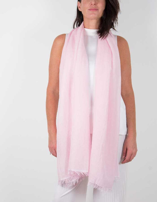 an image showing a silk wool mix wedding shawl in pale pink