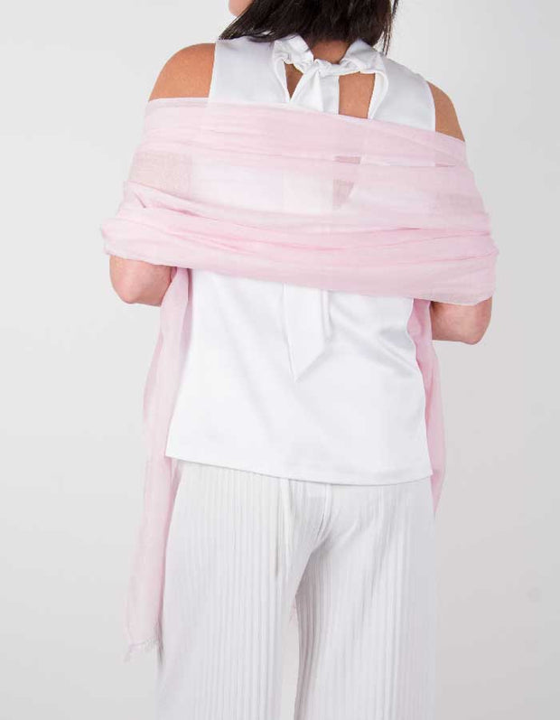 an image showing a silk wool mix wedding shawl in pale pink