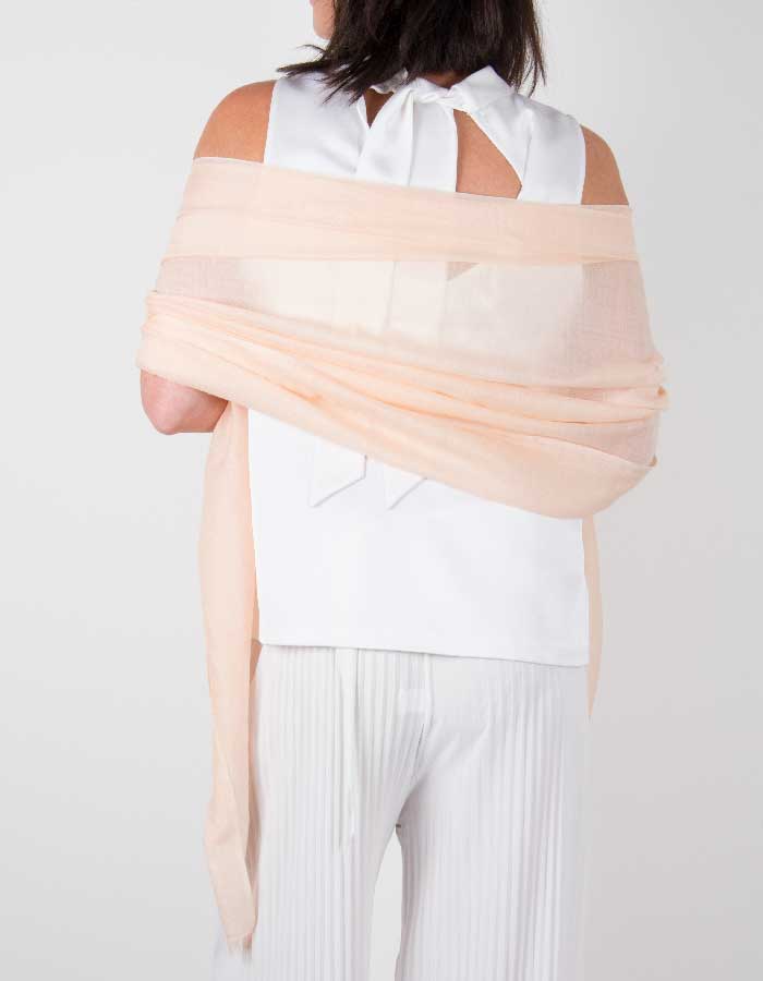 an image showing a silk wool mix wedding shawl in peach