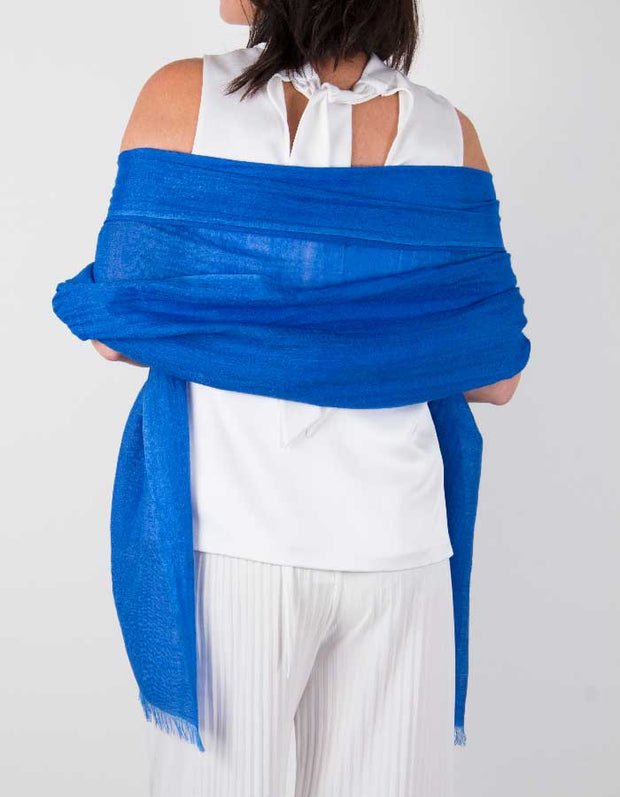 an image showing a silk wool mix wedding shawl in royal blue